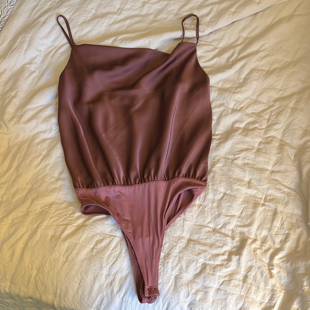 Sleek pink Bodysuit